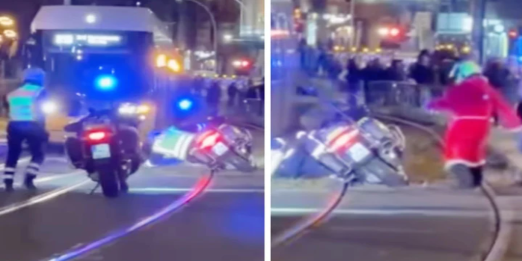 Besynderlige scener: Politibetjent falder af sin motorcykel, så kommer julemanden til hjælp