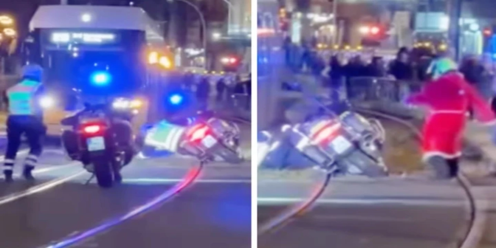 Besynderlige scener: Politibetjent falder af sin motorcykel, så kommer julemanden til hjælp
