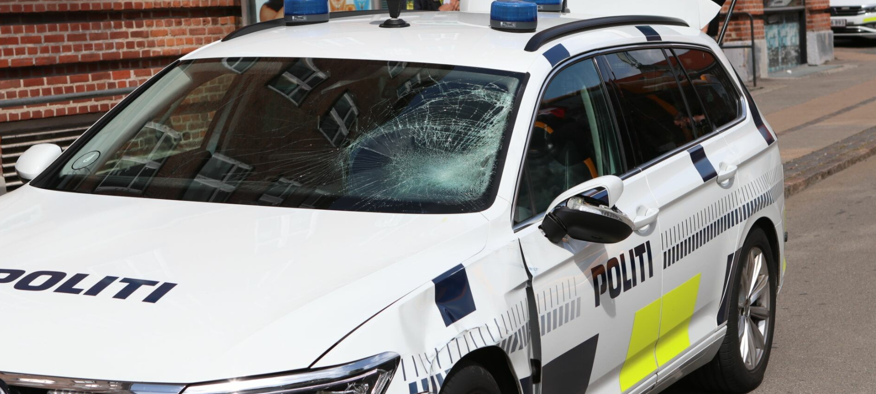 Fodgænger kørt på Riget: Ramt af politibil